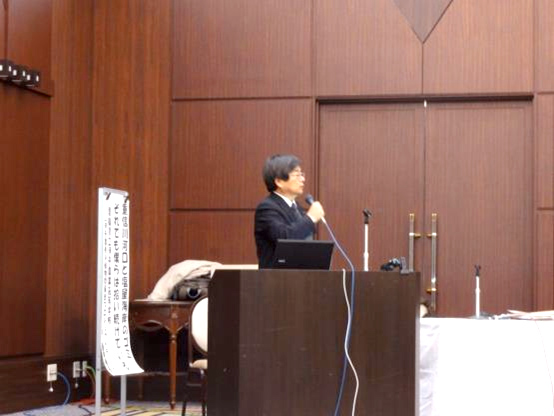 写真：開会挨拶【重信川の自然をはぐくむ会 矢田部龍一 会長（愛媛大学理事・副学長）】